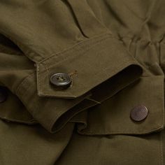 Pre-Owned - No Size Label Estimated EU Size: 46 Estimated US Size: XS Solid Army Green Color Made of Cotton Twill Fabric Fully Lined Button Closure Stars on the collar Tightening elastic at the waist Elbow reinforcements 4 Snapped Flap Patch Pockets Buttoned Epaulet Buttoned Cuffs Removable Throat Latch Measurements: Shoulder: (seam to seam) 18" Jacket Length (Bottom of the collar to bottom of jacket): 30.75" Sleeve Length (top of the shoulder seam to the edge of the vented side of the sleeve): Military Field Jacket, Italian Army, Army Green Color, Size Label, Field Jacket, Twill Fabric, Cotton Twill Fabric, Green Cotton, Army Green