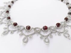 Exquisite crystal choker necklace in Edwardian style. Great as wedding jewelry. The handmade silver lace necklace is made in ancient tatting (frivolite) technique, with woven crystals and Preciosa Czech seed beads. Simple elegance and beauty! ORDERS ABOVE 110$ ARE SHIPPED WITH FedEx or EMS for FREE! When you choose from the drop-down list, Color represents the color of the thread which you combine with crystals from the other dropdown. Seed beads will complement your choice.  Necklace total leng Elegant Handmade Silver Crystal Necklaces, Handmade Silver Crystal Choker Necklace, Elegant Decorative Necklaces For Gifts, Silver Crystal Choker Gift, Crystal Necklaces With Silver Beads For Gift, Crystal Necklaces With Silver Beads As Gift, Beaded Silver Choker Bridal Necklace, Elegant Silver Beaded Necklaces For Celebrations, Crystal Necklace With Silver Beads For Gift