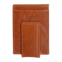 The Sonny is a vegetable tanned genuine leather front pocket money clip. There are multiple card slots and a side slip pocket. On the back is a magnetic money clip and Florsheim logo. This wallet finishes a casual look.Wallet Type: Front PocketCard Capacity: 4 SlotsClosure Type: MagneticPockets: 1 Side Slip Pocket, 4 Inside Card SlotsMeasurements: 4 Width/Inches, .25 Height/Inches, 2.875 Length/InchesBase Material: 100% LeatherFabric Description: LeatherCare: Wipe CleanCountry of Origin: Importe Classic Trifold Wallet With Key Clip For Everyday Use, Classic Rectangular Wallet With Flat Pocket, Classic Rectangular Card Holder With Flat Pocket, Brown Bifold Card Holder With Belt Clip, Classic Bifold Card Holder With Flat Pocket, Leather Wallet With Flat Pocket, Classic Card Holder With Key Clip For Daily Use, Cognac Rectangular Wallet With Rfid Blocking, Brown Everyday Wallet With Key Clip