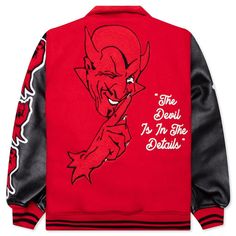 Made from a blend of wool and nylon, the Saint Michael Devil Varsity Jacket takes on a premium aesthetic. The design features leather sleeves along with embroidered patches and phrasing. The snap button closure secures the design, while the hand pockets complete the remainder of the design. Wool/nylon blend Snap button closure Leather sleeves Embroidered patches/phrasing Hand pockets Striped ribbed trims Style No: SM-A22-0000-035 Hooded Embroidered Varsity Jacket For Fall, Red Long Sleeve Varsity Jacket With Patchwork, Red Patchwork Varsity Jacket, Red Patchwork Long Sleeve Varsity Jacket, Varsity Jacket With Embroidered Patch For Fall Streetwear, Fall Outerwear With Embroidered Graphics And Baseball Collar, Fall Outerwear With Embroidered Patch And Baseball Collar, Fall Varsity Jacket With Embroidered Graphics For Streetwear, Hooded Winter Outerwear With Embroidered Patch