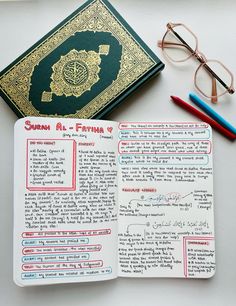 an open book with writing on it next to some glasses and a pair of eyeglasses