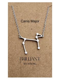 a necklace with the word, brilliant by young on it's front and back side