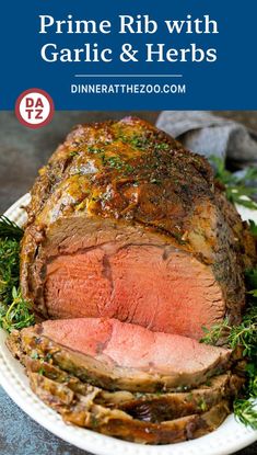 prime rib with garlic and herbs on a plate