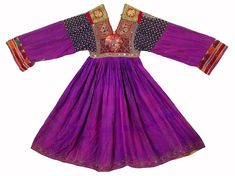 antique orient  nomadic Silk Embroidered Wedding Dress from Afghanistan. A Beautiful end of 20th century, Silk violet dress with silk embroidery wedding dress , in a  good condition.  Total width 154 cm, length 117 cm chest width 38 cm and arm length 52 cm Name : Afghan Silk Embroidered Wedding Dress Category : Antique Origins : Afghanistan Ethnic Group : Pashtun people Techniques : Embroidered Material : 90 % silk, 10 % cotton Condition: with age-related signs of wear, please take a closer look Gold Embroidered Dress, Women Silk Dress, Silk Velvet Dress, Military Costumes, Embroidered Wedding Dress, Chiffon Cocktail Dress, Violet Dresses, Ankle Dress, Silk Wedding Dress