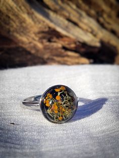 Nickel-free Nature-inspired Round Rings, Adjustable Rings With Pressed Flowers, Nature-inspired Nickel Free Round Rings, Nature-inspired Nickel-free Rings, Unique Adjustable Flower Ring, Green Flower Ring Gift, Nature-inspired Nickel Free Rings, Handmade Orange Rings For Gifts, Handmade Orange Rings As Gift