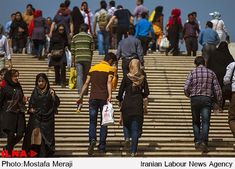 many people are walking up and down the stairs