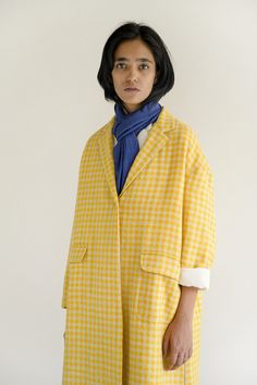 Yellow often likes to hang around with white. they sometimes mix and turn into a different shade altogether but this time they kept to their individual parts.    a woolen jacket | 100% wool    - gathers at the back  - inseam pockets  - made in india  - model is 5'8" and wearing a s / m size    the colour in the photograph may vary slightly from the actual product as it is shot in natural light.    approximate garment     measurements:  small / medium: length: 44" chest: 50" shoulder: 22.5"  larg Spring Wool Coat, Oversized Wool Blazer For Spring, Oversized Wool Coat For Spring, Yellow Wool Long Sleeve Outerwear, Designer Outfits Woman, Medium Length, Outerwear Jackets, Natural Light, Checks