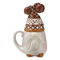 a ceramic mug with a dog wearing a hat