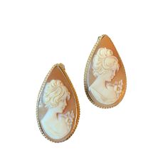 "Tear drop shape cameo shell stud earrings. Carved portrait of a young lady. 14k yellow gold edge and posts, one edge is slightly worn. 1.25\" long x .75\" - 11/16\" wide. Very nice condition. Please reach out if you have any questions. SHIPPING: We strive to package items so that they are not damaged in shipping. However if breakage occurs an insurance claim will have to be processed. To process an insurance claim it is important that you send pictures to us of all pieces of the broken item, th Victorian Earrings, Insurance Claim, Cameo Earrings, Earrings Antique, Cameo Jewelry, Cameo Pendant, Antique Earrings, Pierced Earrings, Tear Drop