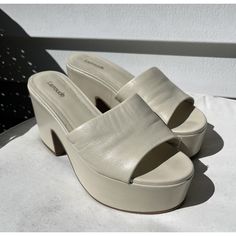 We'll Never Tire Of The Retro Vibes Of These Larroud Platform Slides, Reimagined For Spring In A Playful Print Patent Leather. New For The Season, The Miso's Same Stacked Base And Wide Strap Keep The Style Simple While The Height And Sweet Heart Print Will Get You Noticed. Product Details: White Open Round Toe 3.6 Inch Thick Heel Finely Crafted Rubber Sole For Support, Durability, And Comfort Insole With Memory Foam Cushion And Hot Stamp Handmade In Brazil Minor Cosmetic Flaws That Do Not Affect Wear Are Pictured. Stamp Handmade, Hot Stamp, Platform Slides, Thick Heel, Womens Slides, Sweet Heart, Thick Heels, Retro Vibe, Wide Straps