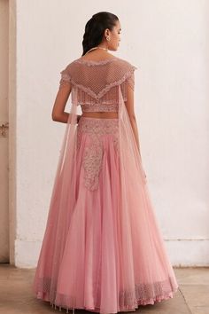 Rose pink attached can-can lehenga featuring floral, prarl, sequin, bead and tassel hand embroidery. Paired with a padded hand embroidered blouse with tassel detailing on the back with attached drape. - Aza Fashions Hand Embellished Pink Sets For Wedding, Pink Hand Embellished Wedding Set, Hand Embellished Pink Wedding Set, Pink Unstitched Lehenga With Embroidered Border, Fitted Pink Embroidered Fabric With Cutdana, Pink Semi-stitched Lehenga With Embroidered Border, Pink Lehenga With Intricate Embroidery, Unstitched, Unstitched Pink Resham Embroidered Fabric, Lehenga Pattern