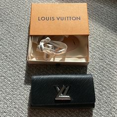 Brand New Louis Vuitton Wallet! Durable Leather. Hasn’t Been Even Used Once Therefore Selling It Almost At Full Cost. I Bought Another Wallet Same Day And Using That One And Decided 2 Was Excessive :-) I Bought This In Nice, France At The Actual Store. I Will Not Connect With You Over Email So Don’t Ask. Price Is Firm. Luxury Wallets With Branded Hardware For Travel, Luxury Travel Wallet With Branded Hardware, Luxury Leather Wallets With Branded Hardware, High-end Leather Wallet For Formal Use, High-end Leather Wallets For Formal Occasions, Luxury Wallets With Branded Hardware For Everyday Use, Luxury Wallets With Branded Hardware, Black Luxury Wallet With Branded Hardware, Formal Leather Wallet With Branded Hardware