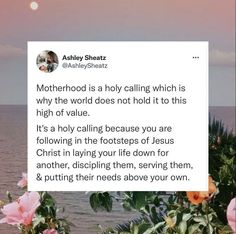 a tweet about motherhood is shown in front of the ocean with pink flowers