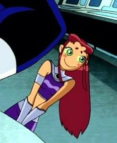 a cartoon girl with long red hair and green eyes standing in front of a train