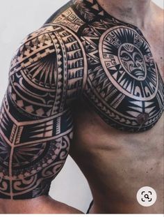 a man with tattoos on his arm and chest