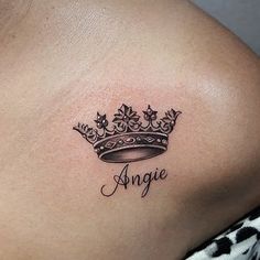 a woman with a crown tattoo on her shoulder and the word angie written in cursive font