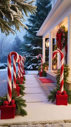 some candy canes and christmas decorations on the front porch