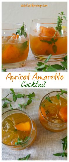 two glasses filled with orange juice and garnished with herbs, on top of a table