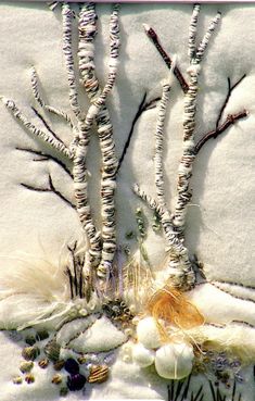 an image of some white plants in the snow