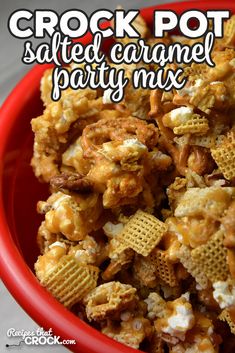 a red bowl filled with crock pot salted caramel party mix