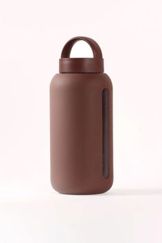 a brown water bottle with a handle on it