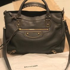 Balenciaga Hand Bag. Brand New With Tags Never Used Luxury Gray Top Handle Satchel, Luxury Gray Bag With Palladium Hardware, Classic Gray Bags With Gold-tone Hardware, Designer Office Bags With Gunmetal Hardware, Designer Office Bag With Gunmetal Hardware, Luxury Gray Satchel Bag, Designer Gray Bags For Daily Use, Designer Gray Shoulder Bag With Gold-tone Hardware, Luxury Gray Shoulder Bag With Palladium Hardware