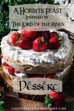 a cake with strawberries on top and the words, hobbits feast inspired by the lord of the rings