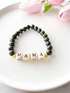 Beaded Mama Bracelet. Wooden Beaded Bracelet. Letter Bead | Etsy Black Letter Round Beads, Black Stretch Bracelet With Spacer Beads As Gift, Handmade Black Name Bracelet For Everyday, Black Beaded Name Bracelet For Gift, Gift Black Beaded Name Bracelet, Black Beaded Name Bracelet Gift, Black Stretch Bracelet With Letter Beads And Round Beads, Adjustable Black Beaded Bracelets For Mother's Day, Black Stretch Bracelet With Letter Beads