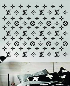 the louis vuitton wall decal is made from black vinyl and features stars