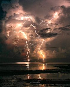 a large cloud filled with lots of lightning