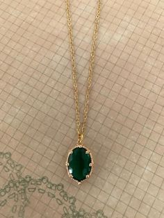 "Lovely and nicely detailed emerald green and gold tone necklace.  Green crystal oval stone is set in exaggerated crown detailed mounting. green stone necklace, green necklace, green crystal, green oval necklace, gold oval necklace, necklace green Pendant measures 5/8\" L X 1/2\" W and is on an 18\" chain. ★ Want to see more?  Please visit my shop at: https://www.etsy.com/shop/DesignsByPeg" Oval Stone Necklace, Simple Green Necklace, Gold Necklace With Green Stone, Emerald Green Necklace Jewelry, Emerald Necklace Aesthetic, Forest Green Necklace, Antique Emerald Necklace, Classic Oval Green Emerald Necklace, Green Necklace Aesthetic