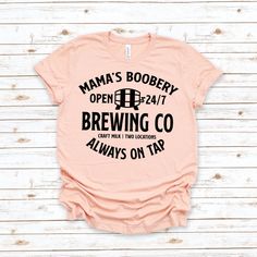 Trendy baby shower gift a shore thing to bring a smile at the party! Mama's boobery brewing co. open 24/7 and always on tap. Amazing new mom gift and makes for a funny carefree breastfeeding gift. Available in Heather Peach (main listing product color,) Heather Gray, and White. Feel free to reach out if you have any questions! New Mom Funny, Breastfeeding Shirts, Gifts For New Mom, Momma Shirts, New Mom Gifts, Breastfeeding Shirt, Mom Funny, Baby Prep, Cute Shirt Designs