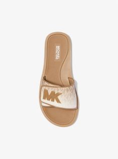 Our Palmer slides are perfect for weekend errands and days spent poolside. Set on a lightweight footbed, this pair features a wide strap splashed with our iconic initials for statement style. They’ll easily complement shorts and casual-cool dresses alike. Shoes Outlet, Wide Straps, Signature Logo, Slide Sandals, Fashion Statement, Open Toe, Nice Dresses, Slides, Initials