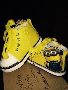 Cool Minion kicks customized for his or her little feet! Size 13 yellow, black, blue and white. Yellow Custom Sneakers With Round Toe, Yellow Customizable Casual Sneakers, Casual Yellow Customizable Sneakers, Fun Yellow Sneakers For Streetwear, Converse High Top Sneaker, Converse Chuck Taylor High Top Sneaker, Yellow Black, Minion, Size 13