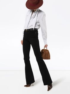 Shop black FRAME low-waist flared jeans with Express Delivery - Farfetch Elegant Mid-rise Cotton Flare Jeans, Chic Flared Hem Flares For Work, Chic Flares With Flared Hem For Work, Elegant Flare Jeans For Workwear, Elegant High Rise Cotton Flare Jeans, Professional Flare Denim Jeans For Work, Modern Flare Jeans For Workwear With Belt Loops, Chic High Rise Flares For Workwear, Trendy Workwear Flares For Fall