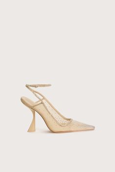 A pointed-toe slingback comma-heel in neutral tones with rhinestone accents along the heel strap, adjustable ankle strap, and fine mesh exterior. — Adjustable buckle on ankle strap — Heel strap — Fine mesh exterior — Rhinestone accents — Runs small, order a full size up Swimming Bag, Cult Gaia, Sand Dollar, Wedding Mood, Kids Sandals, Sling Back, Ankle Strap Heels, Rubber Heels, Mens Swimwear