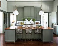 the front cover of southern living magazine, featuring an island with chairs and counter tops