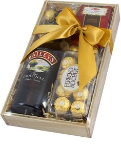 a bottle of wine and chocolates in a gift box