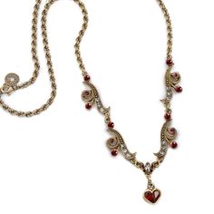 "This necklace features graceful contoured links, embellished with smoke and garnet red Swarovski crystal. From the wave link dangles a heart formed of pear shaped crystals. Double twist French rope chain. Burnished bronze finish. 16\" long plus 2\" extender. Made in our Los Angeles studio. Last photo shows the coordinating earrings which you can view here: https://www.etsy.com/listing/219278072 Contact us for bulk pricing and wholesale information." Cherry Chapstick, Double Twist, Necklace Ruby, Outfit References, Shaped Crystals, Red Heart Earrings, Sweet Earrings, Garnet Red, Fairy Jewelry