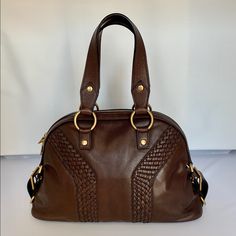 Brand New With Tags, Ysl Brown Leather Tote With Shoulder Strap - Rare & In Perfect Condition! 15” Inch Length 15” Inch Height (With Handles) 8” Inch Wide Handles 7.5” Inches Height Removable Strap 34” Inches Length Silk Lining - Perfect Condition Gold Hardware Braided Leather Forms Signature Y Outside Bag Side Buckles Interior Side Zip Side Pouch Comes With Duster Bag & Ysl Certificate Of Authenticity Purchased At Saks In San Francisco Buy With Confidence! Price Is Firm Vintage Ysl Purse, Ysl Tote Bag, Ysl Tote, Bag Ysl, Vintage Ysl, Yves Saint Laurent Bags, Brown Leather Totes, Saint Laurent Bag, Braided Leather