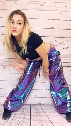 Purple and Teal holographic drawstring pants. Perfect for the kind of people that want to fly to the moon. WAIST INSEAM S27 - 29 30 M30 - 3230- 32 L33 - 3532 - 34 XL36 - 3832 - 34 XXL39 - 4132 - 34 Purple Rave Festival Bottoms, Trendy Purple Bottoms For Festival, Fly To The Moon, Space Pants, Purple Holographic, Purple And Teal, Mens Cuts, Kinds Of People, Hip Hop Fashion