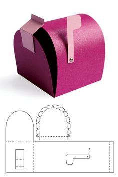 a pink box with a paper cut out of it and the top half is open