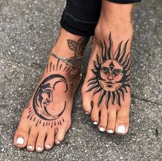 a person with sun and moon tattoos on their feet