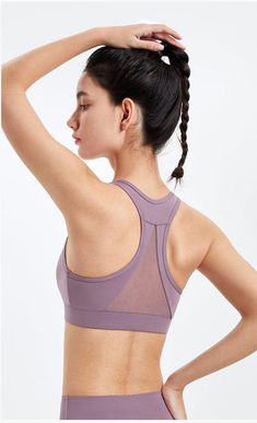 The Emes Shop sports bra is detailed with a round scoop neckline. thick bands. and elevated seaming. Features a triangular shaped mesh paneling in the back for both breathability and style. MATERIAL: 80% Nylon. 20% SpandexMEASUREMENTS: Small Bust: 24.8" in Length: 11.8"in Medium Bust: 26.4" in Length: 12.2"in Large Bust: 28" in Length: 12.6"in X-Large Bust: 28.3" in Length: 13"in Mesh Sports Bra With Built-in Padding For Yoga, Mesh Sports Bra With Built-in Padding For Workout, Mesh Sports Bra With Built-in Padding For Gym, Nylon T-back Sports Bra For Yoga, Mesh Sports Bra With Built-in Bra For Light Exercise, Nylon Sports Bra With Built-in Bra For Training, Nylon T-back Activewear For Yoga, Racerback Sports Bra With Mesh Back For Pilates, Mesh Back Racerback Sports Bra For Pilates