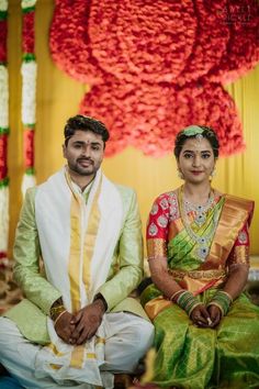 a man and woman sitting next to each other