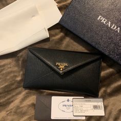 Brand New Comes With Authenticity Cards And All Packaging Including Box Vitello Leather Black With Gold Hardware 3 Card Slots Inside Main Compartment One Zipper Compartment In Back Elegant Envelope Wallets For Gifts, Elegant Envelope Wallets As Gifts, Bags Prada, Document Holder, Prada Bags, Selling On Poshmark, Free Items, Luxury Items, Card Case