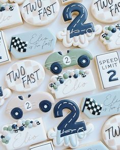 decorated cookies with numbers and cars on them for two fast, two fast birthdays