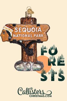 the sign for sequia national park is hanging from a tree trunk with an image of a woman's head on it