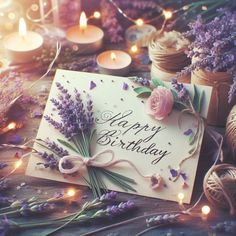 a birthday card with lavender flowers and candles