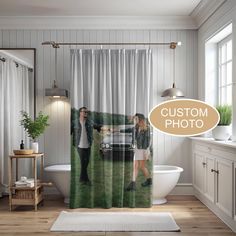 a bathroom with a shower curtain that has the image of two people shaking hands in front of a car